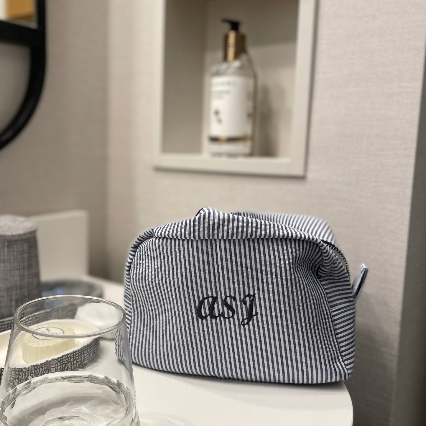 Customized blue and white striped toiletry bag