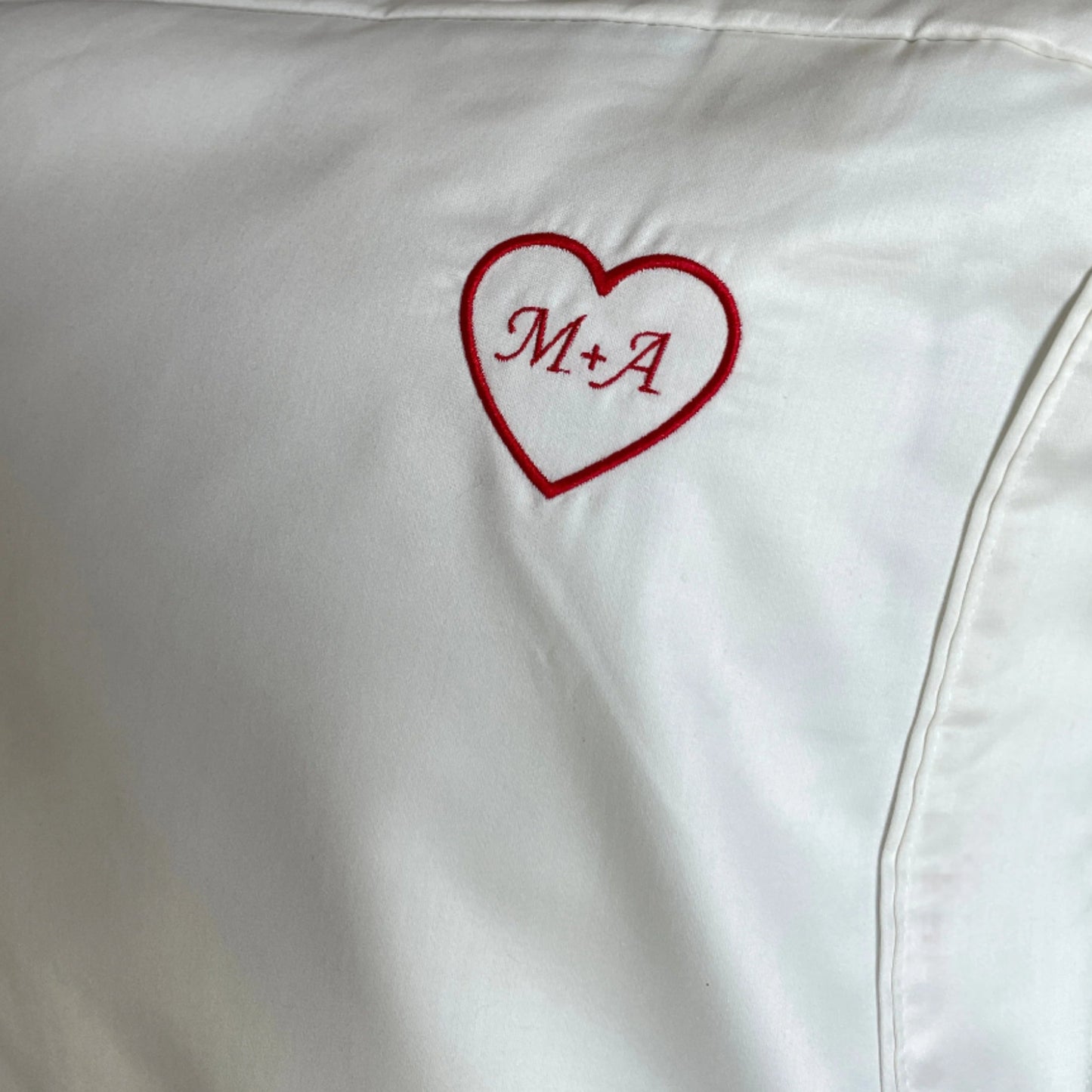 embroidered pillowcase, initials inside heart, heritage threads ltd.