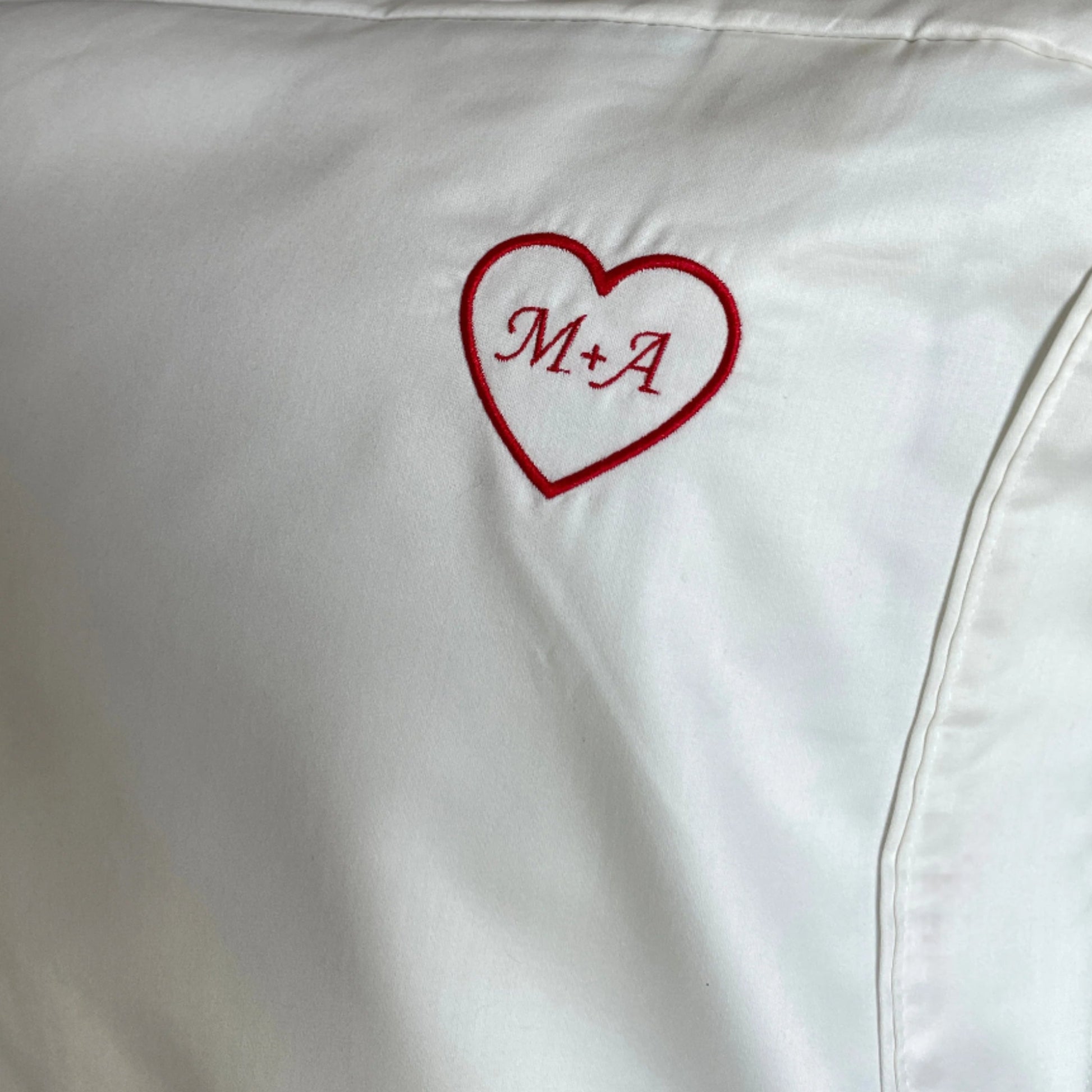 embroidered pillowcase, initials inside heart, heritage threads ltd.